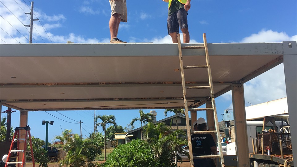 ...Inspecting fit of roof slabs